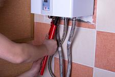 using tankless water heaters, Holliston, Foxboro MA
